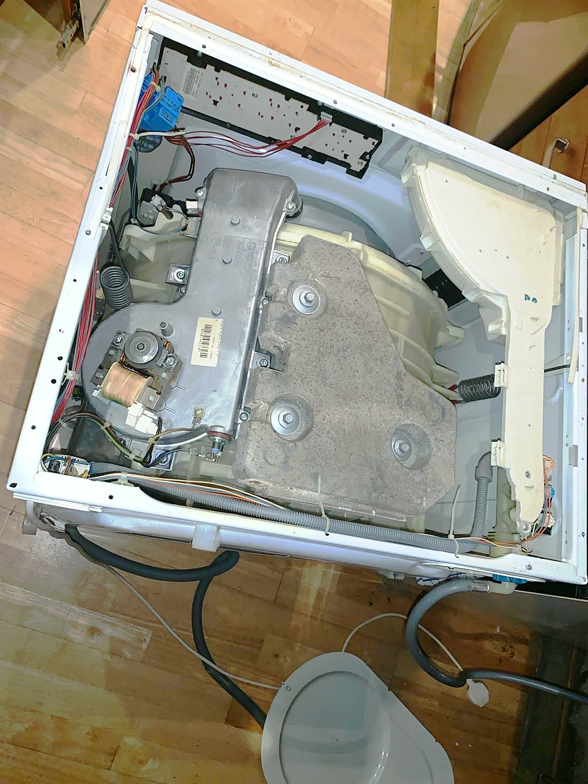 Tumble dryer opened up from the top for diagnosis