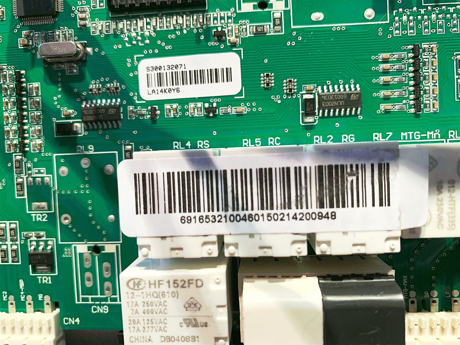 Appliance control board relays checked close up