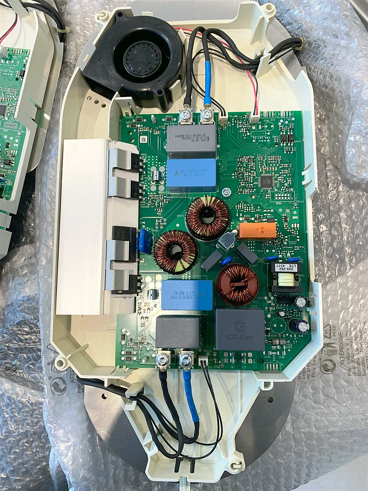 Power board and cooling fan inside an appliance